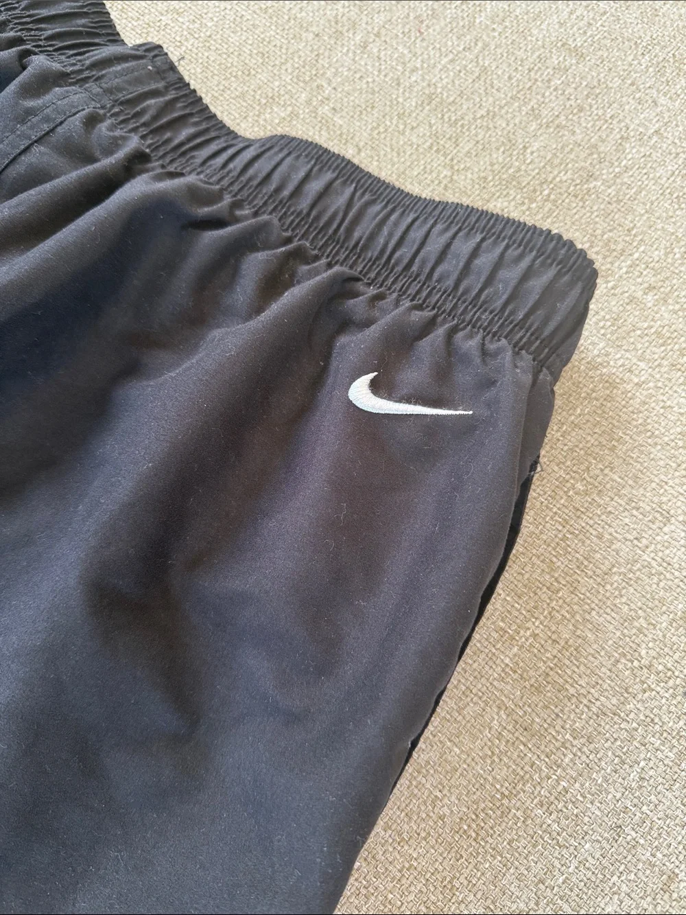 Nike Black Men’s Swim Trunks with White Swoosh - Size L